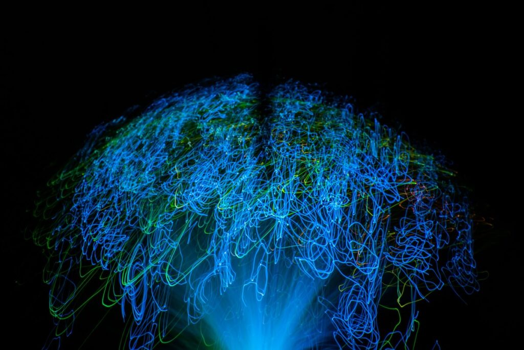 digital brain shaped with blue neural connection glowing lines.